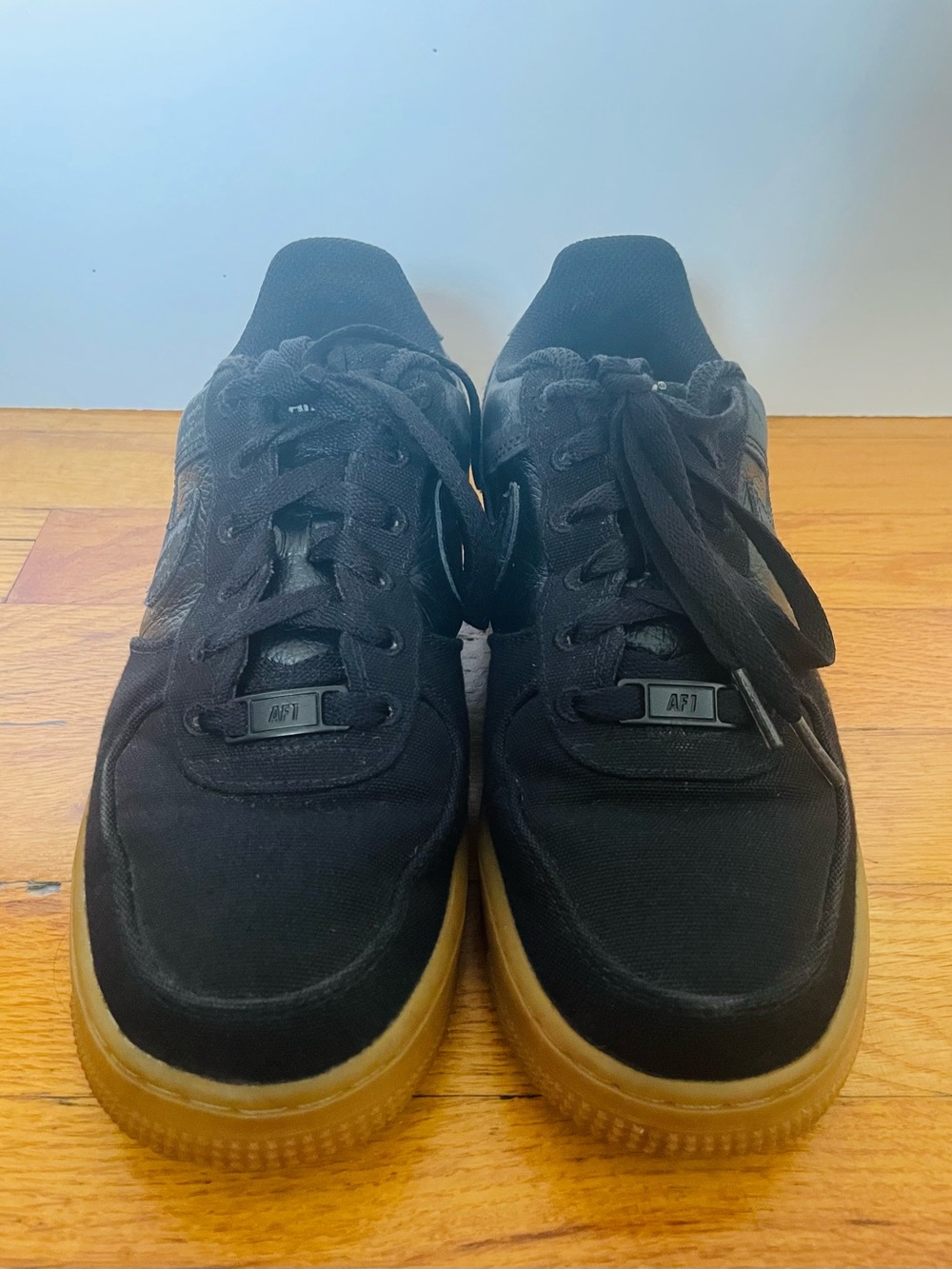 Custom Nike Air Force 1s Low / black-on-black, gum sole Women’s 7.5